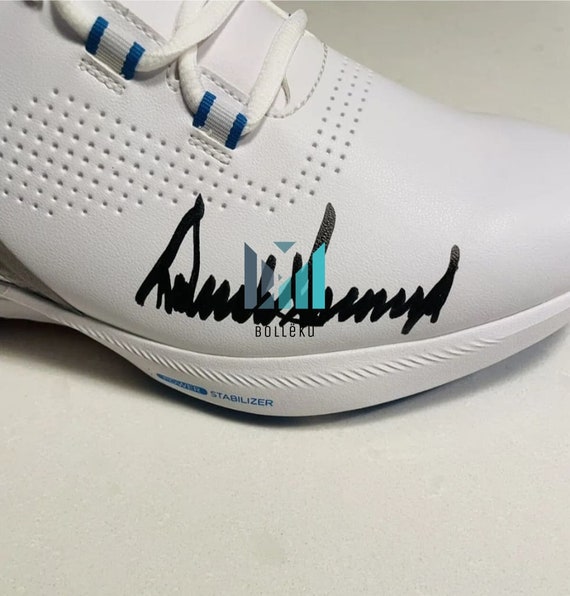 SIGNED TRUMP SHOES Autographed Trump sneakers were snapped up by Roman Sharf  main image 3