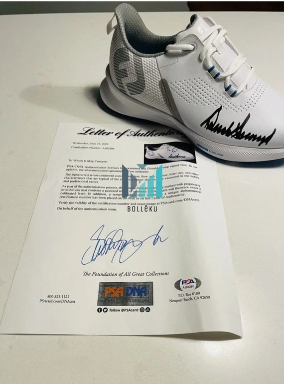 SIGNED TRUMP SHOES Autographed Trump sneakers were snapped up by Roman Sharf  main image 2