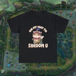 May include: Black t-shirt with a cartoon character wearing a hat and holding a telescope. The text "On my way to Shroom U" is printed on the shirt.