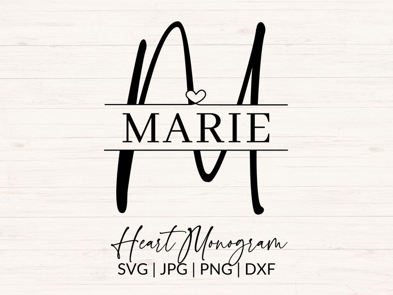 Peut inclure: Un monogramme noir et blanc avec la lettre "M" et le mot "MARIE" centr&eacute; entre deux lignes horizontales. Un petit c&oelig;ur est au-dessus du mot "MARIE". Le texte "Heart Monogram SVG | JPG | PNG | DXF" est sous le monogramme.