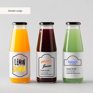May include: Three glass bottles with labels. The bottles contain orange, purple, and green liquids. The labels have the text "Lemon Drink", "Grape Juice", and "Instant Classic". Each label has contact information for the company.