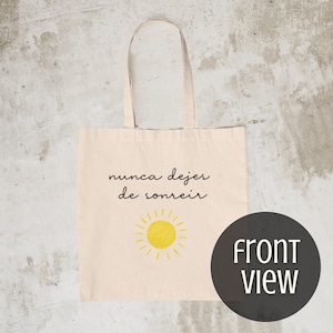 Nunca dejes de sonreir / sonríe, hasta con tormenta ESPAÑOL/SPANISH Bolsa de tela de algodón