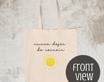 Bolsa de lona de algodón con cita en español: Nunca dejes de sonreír