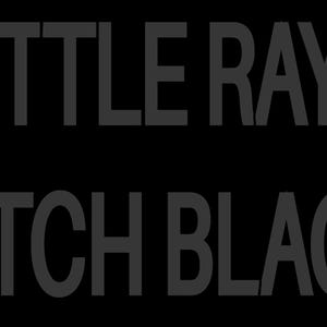 May include: Black background with the text "A LITTLE RAY OF PITCH BLACK" in a dark gray sans-serif font. The text is centered and takes up most of the image.