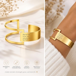 May include: A gold-colored cuff bracelet with the inscription "She has fire in her soul and grace in her heart." The bracelet has a unique open design with a rectangular plate and two curved bands. The bracelet is made of high-quality stainless steel.