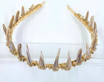 Shell spikes and gold crown