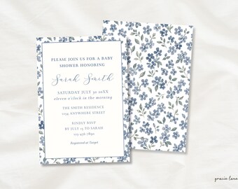 May include: A rectangular baby shower invitation card featuring a white center with blue text and a blue floral border, paired with a matching card back covered in a blue and white floral pattern. The text reads: PLEASE JOIN US FOR A BABY SHOWER HONORING Sarah Smith SATURDAY JULY 30 20XX eleven o'clock in the morning THE SMITH RESIDENCE 1234 ANYWHERE STREET KINDLY RSVP BY JULY 15 TO SARAH 123-456-7890 Registered at Target.