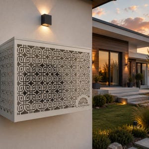 May include: A white rectangular metal enclosure featuring a laser-cut geometric pattern of interlocking loops and squares. The unit is mounted on a light-colored exterior wall and displays the brand name LAZERHANE in the bottom right corner.