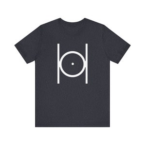 May include: A dark heather grey t-shirt with a white graphic of a circle with a dot inside, surrounded by two vertical lines.