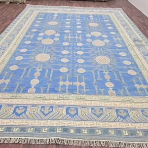 Blue Turkish Rug: Handmade Knotted Wool, Antique Floral Design