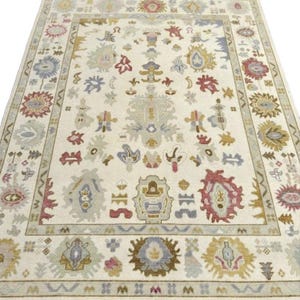 Beige background and blue beautiful design oushak hand knotted wool rug for living room and home decor in 8x10,9x12,10X13,12X18sizes.