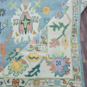 Handmade Oushak Wool Rug: Sky Blue Floral Design