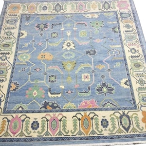 Hand Knotted Wool Oushak Rug: Blue, Beige Floral Design