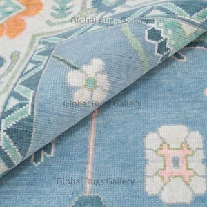 Hand Knotted Wool Oushak Rug: Soft Blue Floral Design, 8x10