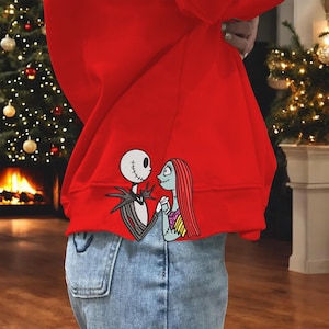 Disegno ricamo macchina cartone animato, disegno ricamo felpa con fiocco laterale coppia, file disegno ricamo film di Natale coppia
