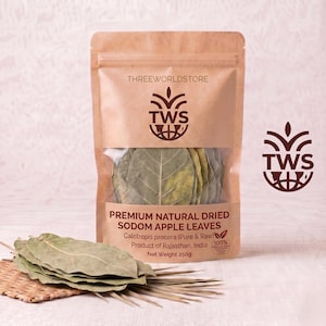 May include: A brown paper pouch containing dried Sodom apple leaves, labeled THREEWORLDSTORE TWS. The text reads PREMIUM NATURAL DRIED SODOM APPLE LEAVES, Calotropis procera (Pure & Raw), Product of Rajasthan, India, and Net Weight 250g.