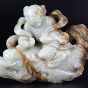 Chinese jade figure 17th century / 18th century Ming dynasty / Qing dynasty celadon and russet jade boy on carp antique figurine sculpture