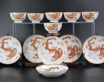 Yongzheng iron red and gilt six tea cups and six tea saucers Qing dynasty Chinese porcelain 18th century w/ dragon decor Kangxi Qianlong