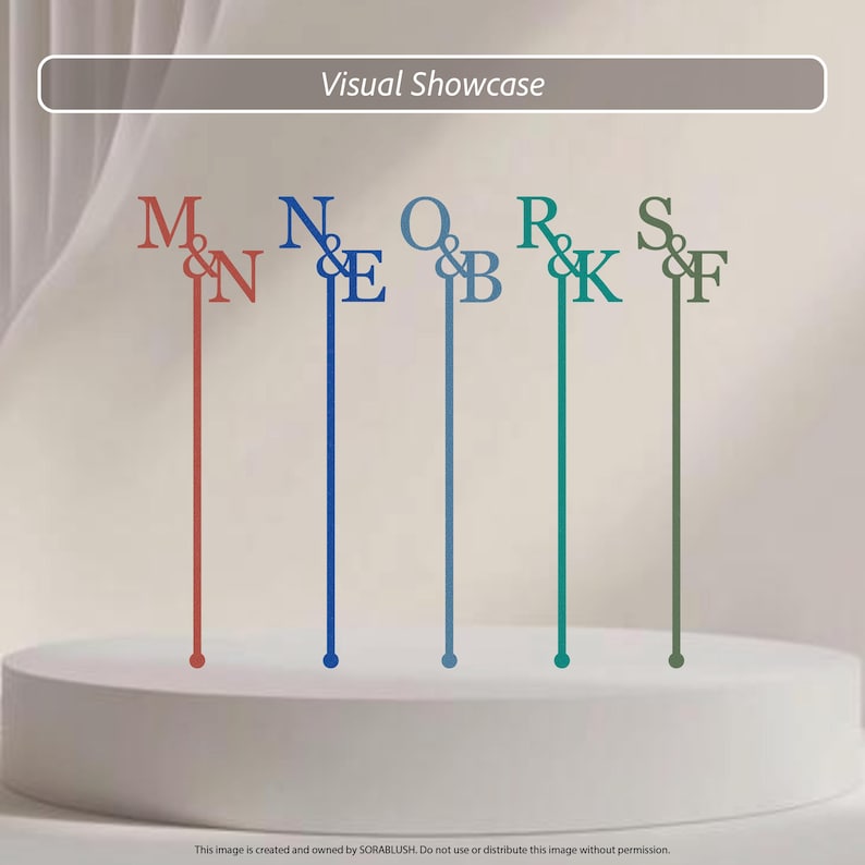 May include: Five thin, vertical cake toppers featuring letter pairs M&N, N&E, O&B, R&K, and S&F in red, blue, light blue, teal, and olive green. Each topper has a long, slender stem ending in a small circular base, displaying serif typography.