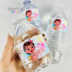 May include: Three clear plastic water bottles with white caps, each featuring a custom label. The label displays a cartoon character with dark hair and a pink flower, a yellow sun, palm trees, and the text Sarah turns three in pink script.