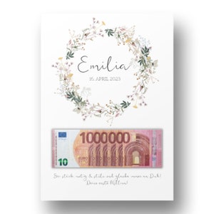 May include: A white card with a floral wreath and the name "Emilia" and the date "16. APRIL 2023". A fake 10 euro bill with the text "1000000" is attached to the card. The text "Sei stark, mutig & st&ocirc;le und glaube immer an Dich! Deine erste Million!" is printed on the card.