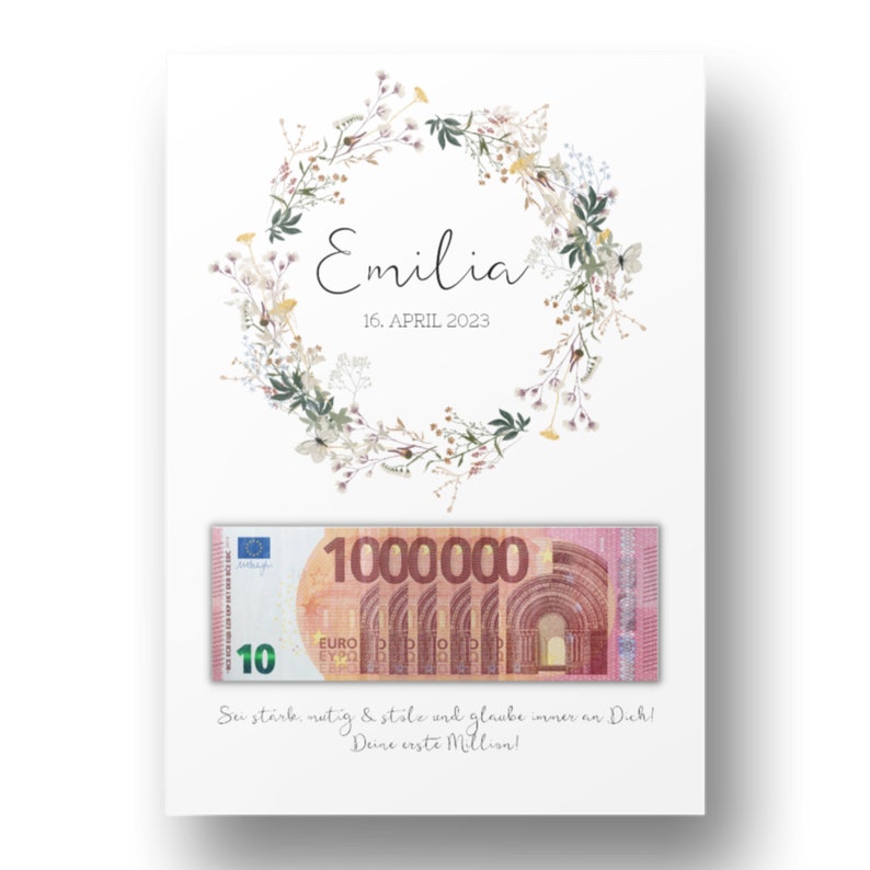 May include: A white card with a floral wreath and the name "Emilia" and the date "16. APRIL 2023". A fake 10 euro bill with the text "1000000" is attached to the card. The text "Sei stark, mutig & st&ocirc;le und glaube immer an Dich! Deine erste Million!" is printed on the card.