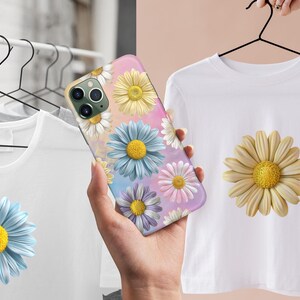May include: A phone case with a colorful floral design featuring daisies in shades of pink, blue, and yellow. The case has a white background with a subtle watercolor effect.