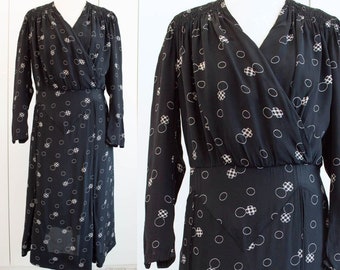 1930s black day dress with geometric print, size 40
