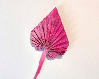 Pink palm leaf cake topper