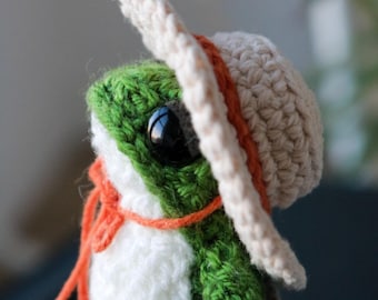 Patrón de sombrero de paja para rana tejida