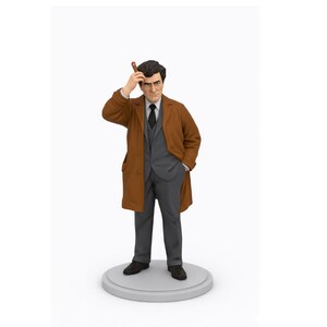 May include: A figurine of a man in a brown overcoat, gray suit, and black tie, holding a cigar. The figure stands on a gray circular base, with one hand in his pocket.