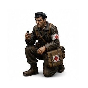May include: A detailed figurine of a kneeling medic in a World War II uniform. The figure wears a brown leather jacket, pants, and boots, with a black beret. A red cross is visible on the arm and medical bag. The medic holds a small object.