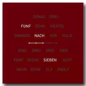 Könnte beinhalten: Ein roter Hintergrund mit weißem Text und einem grauen Schieberegler. Der Text lautet "GENAU DREI- FUNF ZEHN VIERTEL ZWANZIG NACH VOR HALB EINS ZWEI DREI VIER FÜNF SECHS SIEBEN ACHT NEUN ZEHN ELF ZWOLF".