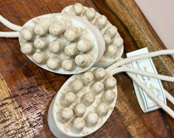 Barra de jabón de masaje en una cuerda