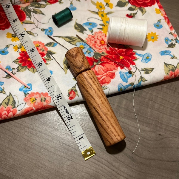 Sewing needle holder container made out of oak wood and poplar wood turned on a lathe perfect for embroidery or sewing projects for storage