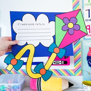 May include: A blue and yellow kite with a pink and green tail. The kite has a purple flower with a yellow center. The text "If I were a kite, I'd fly to..." is written on a white cloud.