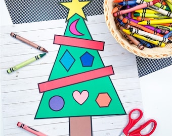 以下が含まれることがあります： 黄色い星がついた緑色のクリスマスツリーの切り抜き。赤い三日月、青いひし形、青い五角形、紫色の円、ピンク色のハート、オレンジ色の六角形など、さまざまな色の形があります。クレヨンとハサミも見えます。