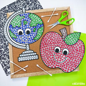 May include: A craft activity featuring a globe and an apple cutout with dot patterns, accompanied by green scissors and white cotton swabs on a cork board. The globe is blue and green, while the apple is red and green, both with googly eyes.