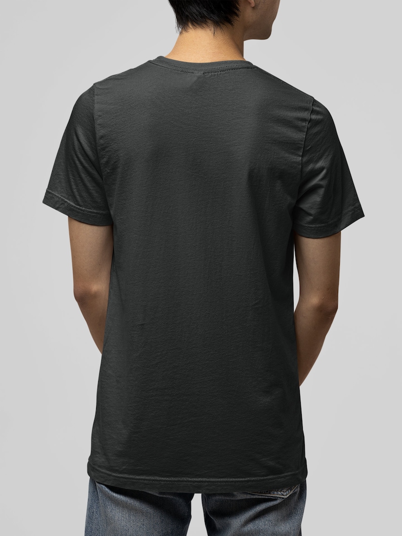 May include: A plain black t-shirt with short sleeves. The t-shirt is made of a soft, comfortable fabric.