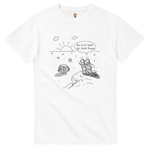 May include: White t-shirt featuring a black and white cartoon illustration. The design depicts two flies looking at a sunset with the text "You must never go down there" in a speech bubble. A humorous graphic tee.