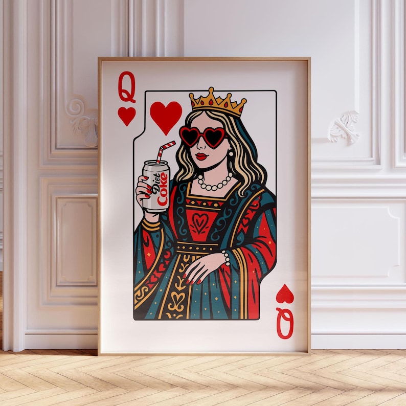 May include: A framed wall art print featuring a stylized Queen of Hearts playing card illustration. The queen wears a gold crown, heart-shaped sunglasses, and a pearl necklace, while holding a silver can labeled Diet Coke with a red striped straw.
