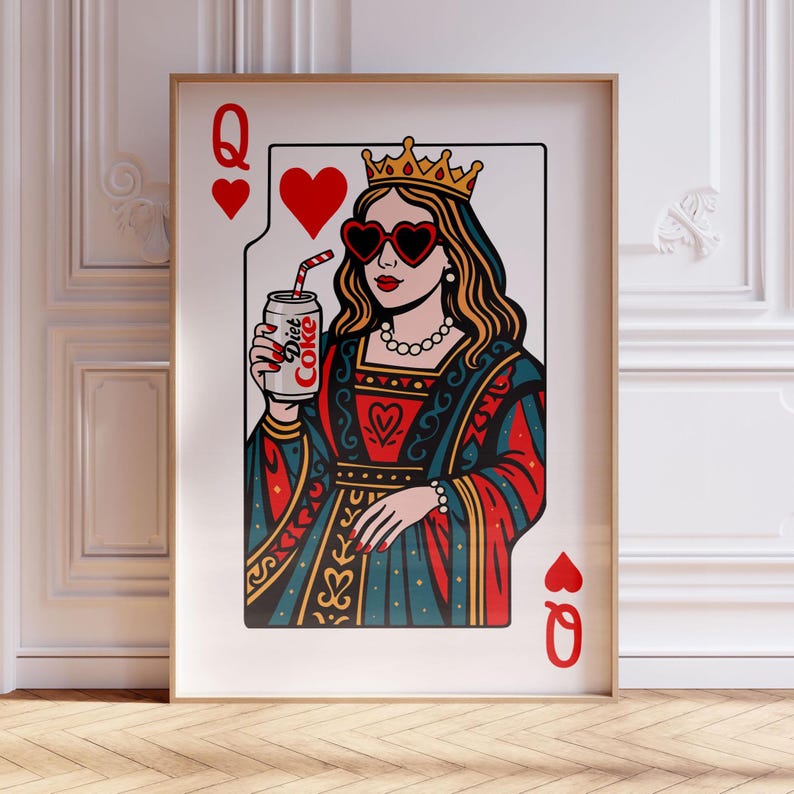 May include: A framed wall art print featuring a playing card design of a queen wearing a gold crown and red heart-shaped sunglasses. The queen holds a silver can labeled Diet Coke with a red and white striped straw, set against a red and blue gown.