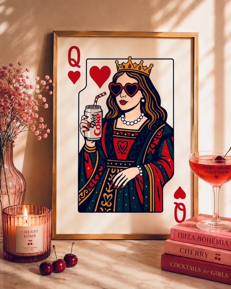 May include: A framed wall art print depicting a Queen of Hearts playing card character wearing heart-shaped sunglasses and a crown, holding a silver Diet Coke can with a red and white striped straw, rendered in a bold, colorful graphic illustration style.