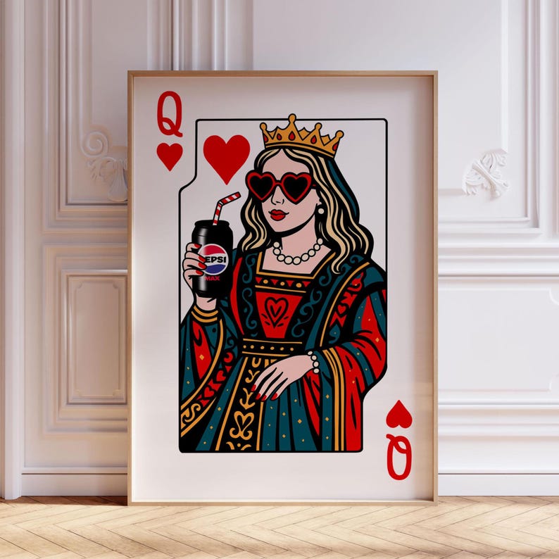 May include: A framed art print featuring a stylized illustration of the Queen of Hearts holding a Pepsi can. The queen wears heart-shaped sunglasses, a crown, and a red, green, and gold gown. The print has a white border and the card's suit symbols.