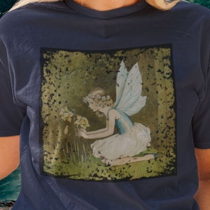 Soft Grunge Fairycore Aesthetic Tshirt - Fairy Wings Tending Daffodils in Meadow Daisy Crown - Cottagecore Goblincore Fairy Garden Fairytale