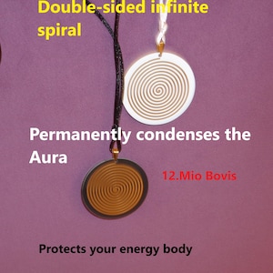 May include: Two circular pendants featuring an infinite spiral design. One pendant is white with a brown spiral on a white cord, and the other is brown with a black spiral on a black cord. Text reads: Double-sided infinite spiral, Permanently condenses the Aura, 12.Mio Bovis, Protects your energy body.
