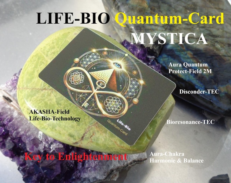 May include: A black Life-Bio Quantum-Card Mystica with a key and eye design, resting on a green stone and purple crystal. Text includes "AKASHA-Field Life-Bio-Technology" and "Key to Enlightenment". Additional text mentions "Aura Quantum Protect-Field 2M".