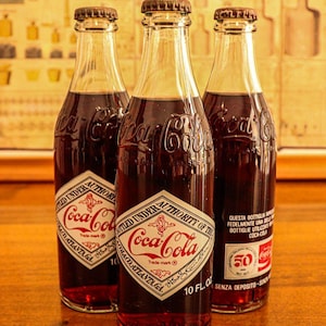 Vintage Coca-Cola 50th Anniversary Bottle (1927–1977) – Rare Collectible in Pristine Condition