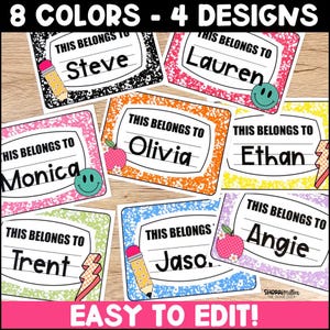 May include: A selection of name tags in various colours, each with the text "THIS BELONGS TO" and a different name. The designs include illustrations of pencils, apples, and smiley faces. The image also displays the text "8 COLORS - 4 DESIGNS" and "EASY TO EDIT!"