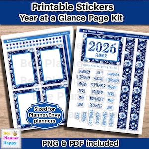 May include: Printable sticker sheets for planners. The sheets feature a blue and white floral design with the text "2026 Planner" and monthly labels. The stickers are sized for Planner Envy planners. The image includes the text "Year at a Glance Page Kit."